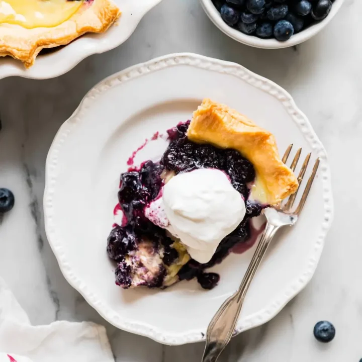 Creamy Lemon Tart with Blueberry Sauce: A Refreshing Dessert
